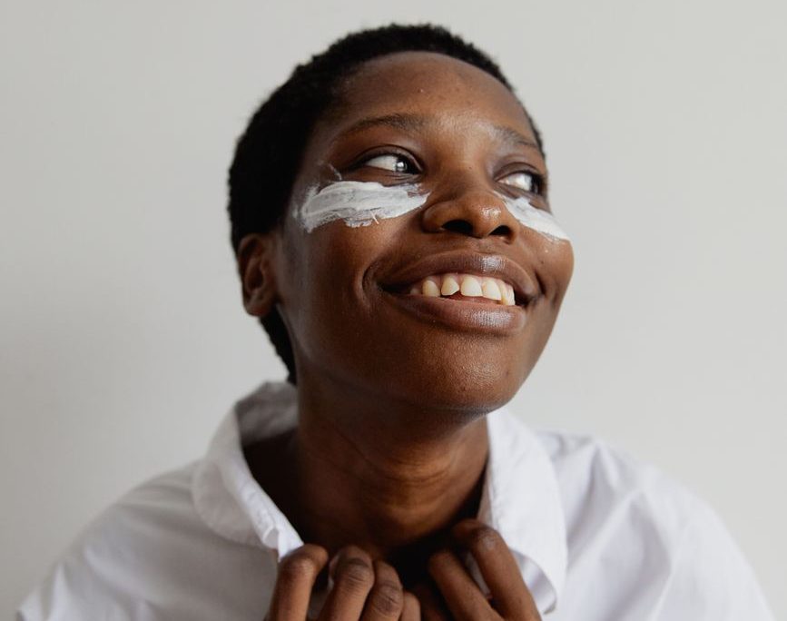 smiling woman holding collar